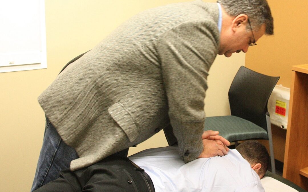 chiropractic practioner and patient